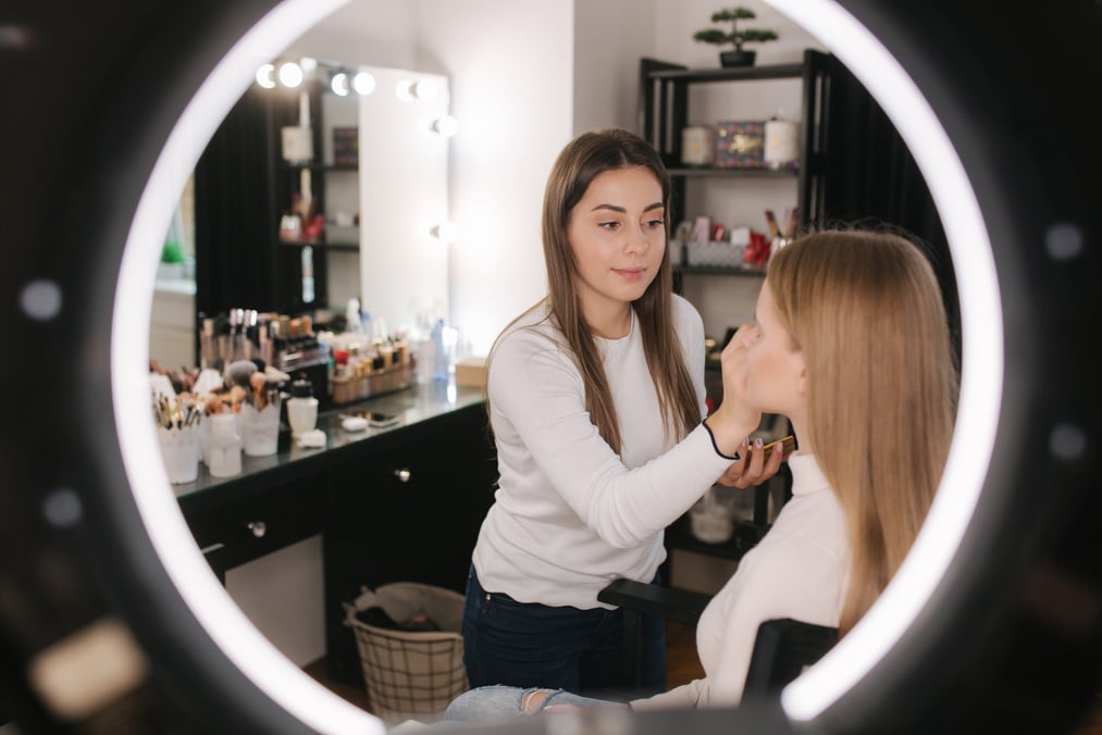 Makeup Artist Working with a Client   